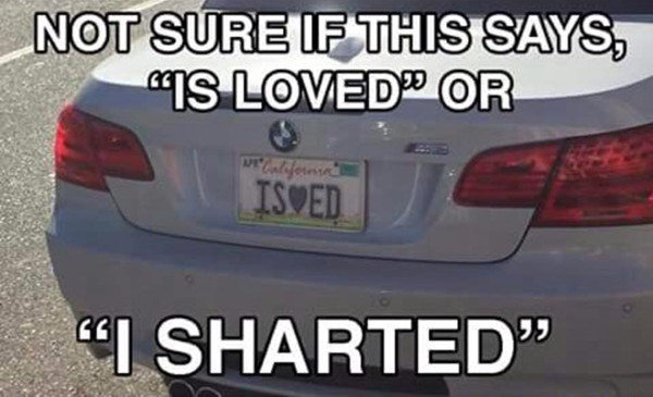 License Plate: Not Sure if this says, "is loved" or "I sharted"